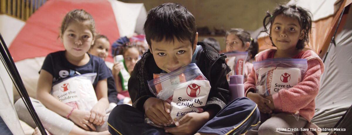 Image of children who have received care kits from Save The Children in Mexico